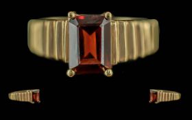 Ladies 18ct Gold Single Stone Ruby Set Ring, Gold Marks to Interior of Shank. The Step-cut Ruby of