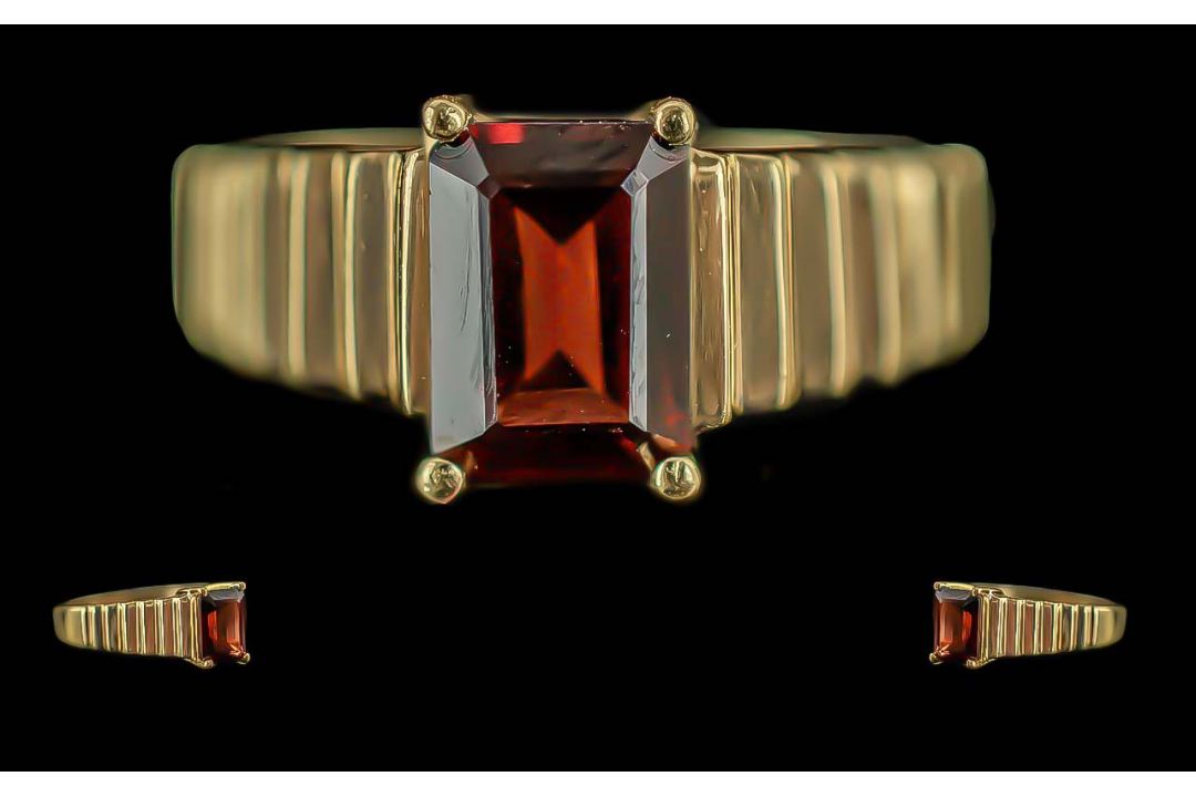 Ladies 18ct Gold Single Stone Ruby Set Ring, Gold Marks to Interior of Shank. The Step-cut Ruby of