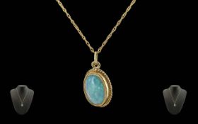 Ladies - Pleasing Quality 9ct Gold Opal Set Pendant / Drop Attached to a 9ct Gold Chain. Both Marked