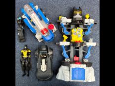 Box of Batman Items, including trucks, cars, figure, tower, bike, etc.