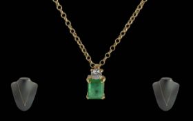 Ladies Fine 18ct Gold Emerald / Diamond Set Pendant Drop Attached to a 9ct Gold Chain. The