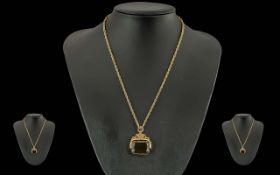 An Antique Period - Fine Quality 9ct Gold Crested - Smoky Topaz Set Swivel Fob, Attached to a Fine