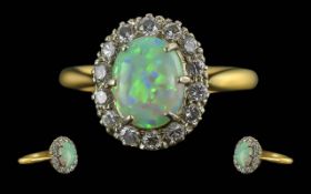 Ladies 18ct Gold and Platinum Opal and Diamond Set Cluster Ring. Marked 18ct and Platinum to
