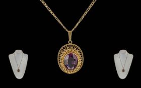 Ladies Pleasing 9ct Gold Amethyst Set Pendant Attached to a 9ct Gold Fancy Chain. Both Pendant and