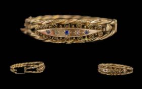 Edwardian Period 1902 - 1910 Ladies 9ct Gold Ornate Hinged Bangle, Set with Sapphires and