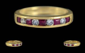 Ladies Attractive 18ct Gold Ruby and Diamond Set Channel Ring. Full Hallmark to Interior of Shank.