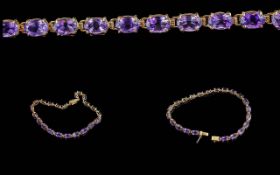 Ladies - Pleasing 14ct Gold Amethyst Set Line Bracelet. Marked 585 - 14ct. Well Matched Amethysts of