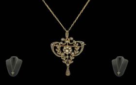 Antique Period 9ct Gold Open Worked Pendant / Brooch Set with Seed Pearls of Excellent Lustre, of