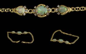 Ladies 18ct Gold Opal Set Bracelet. Marked 750 - 18ct.