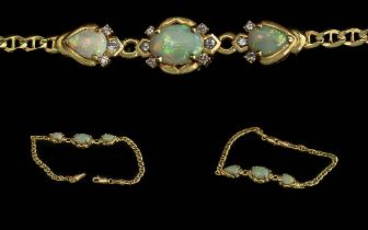 Ladies 18ct Gold Opal Set Bracelet. Marked 750 - 18ct.