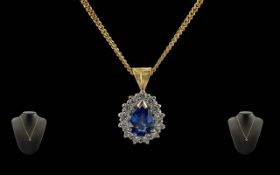 Mappin & Webb Ladies 18ct Gold Sapphire and Diamond Set Pendant, Attached to a 18ct Gold Chain.