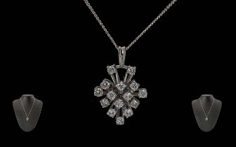 Ladies Attractive 18ct White Gold Diamond Set Pendant Attached to a 18ct White Gold Chain.
