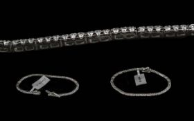 Ladies - Superb Platinum Diamond Set Line Bracelet, Marked 950 Platinum.