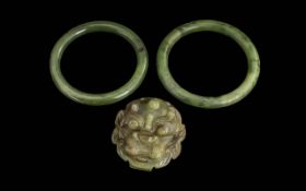A Group of Jade, including two bangles,