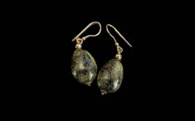 A Pair of 9ct Gold Earrings set with col