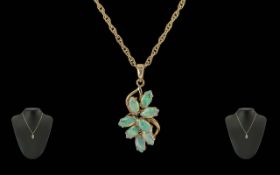 Ladies 9ct Gold Opal Set Pendant, Attached to a 9ct Gold Chain. Marked 9ct. Well Matched Opals of