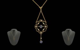Edwardian 9ct Gold Pendant with integral necklace, pendant set with central blue sapphire surrounded