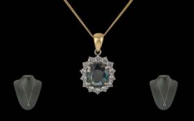 Ladies 18ct Gold - Pleasing Diamond and Sapphire Set Pendant - Attached to a 9ct Gold Chain. Pendant