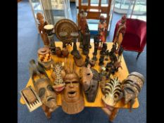 Box & Bag of Carved Figures, comprising African style animals, figures, ornaments and related.