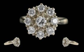 Ladies 18ct White Gold Diamond Set Cluster Ring. Flower head Design. Marked 18ct to Interior of