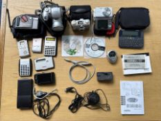 Box of Cameras & Calculators, to include Fuji Film, etc.