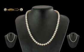 Ladies Fine Quality Single Strand Pearl Necklace with 18ct Gold Clasp, Gold Mark to Clasp. The