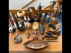 Two Bags of Wooden Carved Ornaments, assorted African figures, wooden bowls, shields, etc.