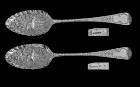 A Fine Pair of Matched Sterling Silver Fruit Preserve Berry Spoons with Ornate Embossed