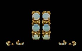 Ladies Pair of 9ct Gold Earrings, Set with Opals. The Opals of Pleasing Colour, Marked 9ct. Weight
