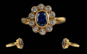 Ladies 18ct Gold Diamond & Sapphire Set Cluster Ring - Flowerhead Setting. The Central Sapphire Of