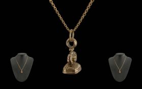 A Fine 9ct Gold Box Chain with Attached 9ct Fib / Seal With The Word Anna. Marked 9ct. Length 19