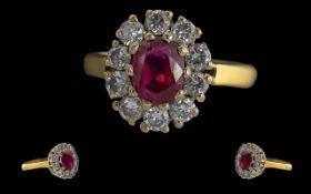 Ladies - Pleasing Quality 18ct Gold Ruby and Diamond Set Ring. Flower head Design. Full Hallmark