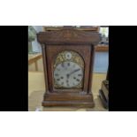 Edwardian Mantle Clock, silvered dial with Roman numerals, rectangular case. Height 15.5''.