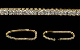 Ladies Fine Quality 18ct Gold Diamond Set Line Bracelet, Marked 750 - 18ct. The Well Matched