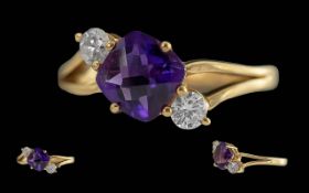 Ladies 18ct Gold 3 Stone Amethyst / Diamond Set Dress Ring. Marked 18ct to Interior of Shank. The