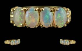 Ladies Attractive 18ct 4 Stone Opal Set Ring. Marked 18ct to Shank. Well Matched Opals of Pleasing