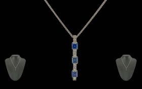 Ladies 18ct White Gold Stylish and Exquisite Sapphire and Diamond Set Pendant Drop, Attached to a