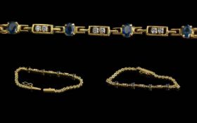 Ladies Pleasing Quality and Attractive 18ct Gold Diamond and Sapphire Set Fancy Line Bracelet.