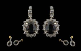 Ladies Fine Pair of 18ct Gold Diamond and Set Earrings. Marked 18ct. The Central Sapphires