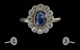 Ladies 18ct White Gold Diamond / Sapphire Set Cluster Ring. Marked 18ct to Interior of Shank. The