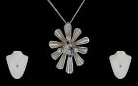 Ladies Platinum Diamond / Sapphire Set Pendant Attached to a Platinum Chain. Marked for Plat 950.