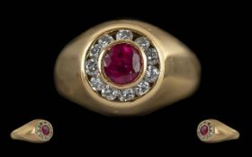 Ladies Pleasing 18ct Gold Ruby and Diamond Set Ring. Marked 18ct to Interior of Shank. Central