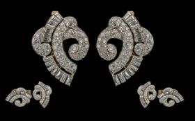 Cartier Paris Pair of 18ct White Gold Clip On Earrings, set with round modern brilliant and baguette