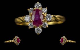 Ladies Quality 18ct Gold Ruby and Diamond Set Cluster Ring. Marked 18ct to Interior of Shank. The
