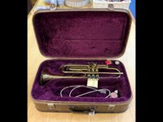Trumpet in Fitted Leather Case, lined in plum velveteen, with valve oil etc.