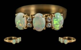 Ladies 18ct Gold Opal and Diamond Set Ring, Raised Open Setting, Marked 18ct to Shank. The 3 Well