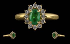 Ladies 18ct Gold Pleasing Quality Emerald & Diamond Set Ring, not marked tests 18ct.