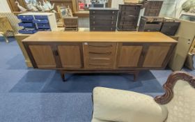 G Plan Teak Sideboard, with four central drawers between two storage cupboards.