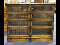 Pair of Globe-Wernicke Stacking Bookcases, four sections to each with bases and tops.