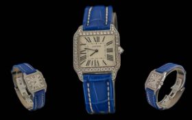 Cartier - Santos Dumont Ladies 18ct White Gold Diamond Set Bezel Quartz Wrist Watch. Model No